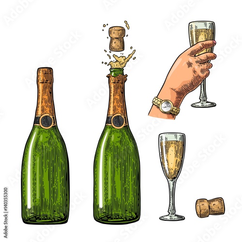 Bottle of Champagne explosion and hand hold glass.