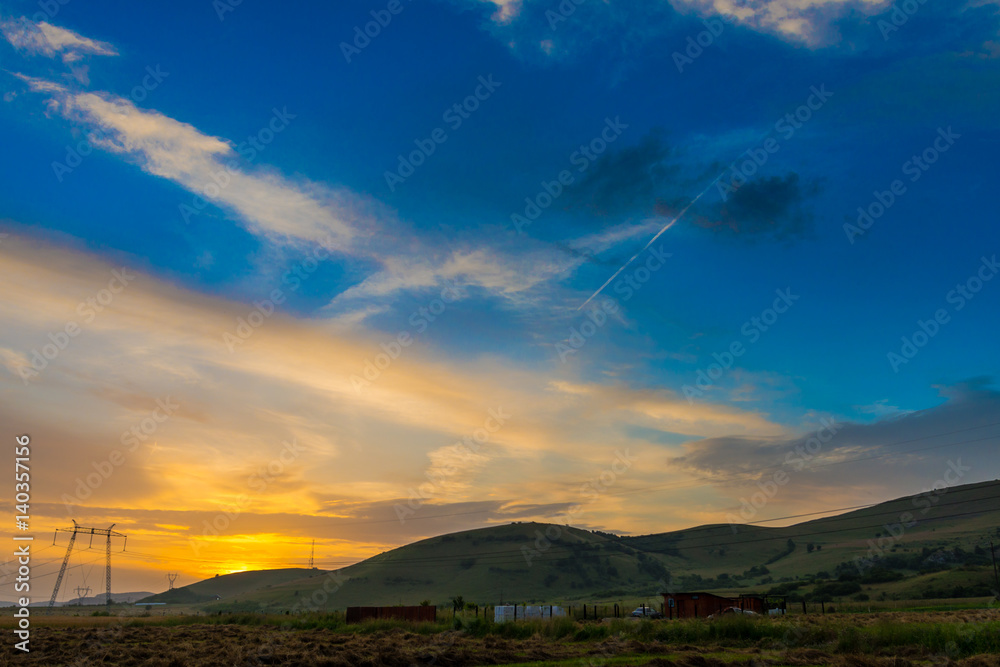 Obraz premium Beautiful clouds at the sunset