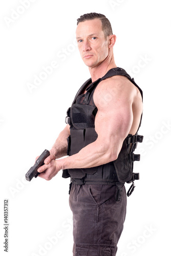 tactical law enforcer posing isolated in white