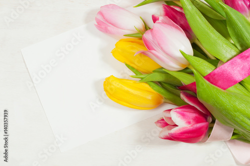 Fototapeta Naklejka Na Ścianę i Meble -  Bouquet of tulips  and blank greeting card