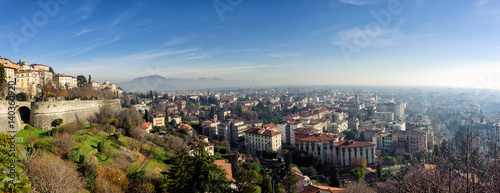 Aerial panoramic view of foggy Bergamo town in northern Italy