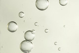 Light fizz bubbles soars over a blurred background