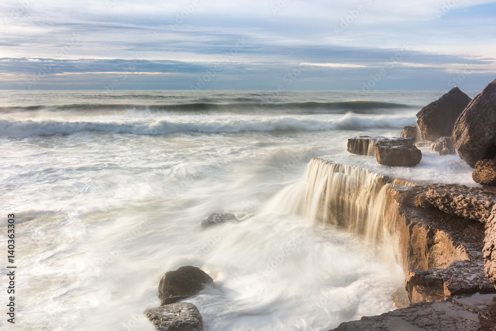 Fototapeta premium Wave veil, high tide at sunset