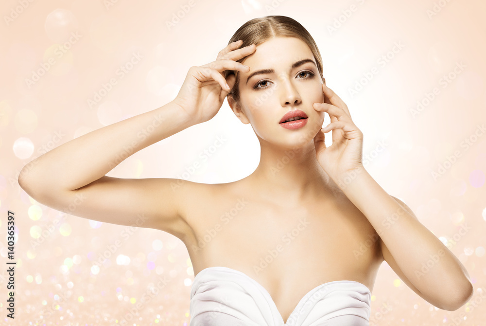 Fototapeta premium Woman Touching Face, Beauty Model Skin Care, Beautiful Girl Natural Makeup Portrait, Looking at Camera