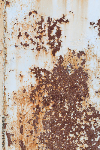 rusty grungy metal and flaky white paint