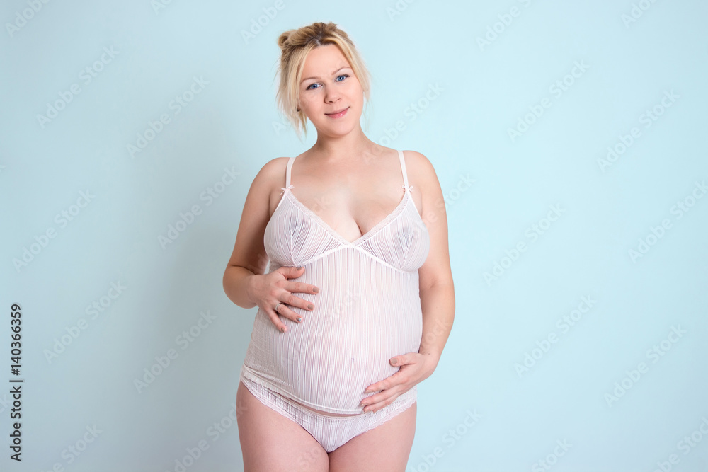 pregnant girl. She hugs her belly. future mom. 37 weeks, 38 weeks, 39 weeks, 40 weeks pregnant girl. She hugs her belly. future mom. 37 weeks, 38 weeks, 39 weeks, 40 weeks