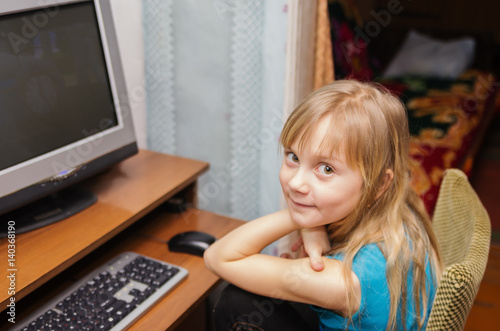 Seven-year-old girl at the computer
