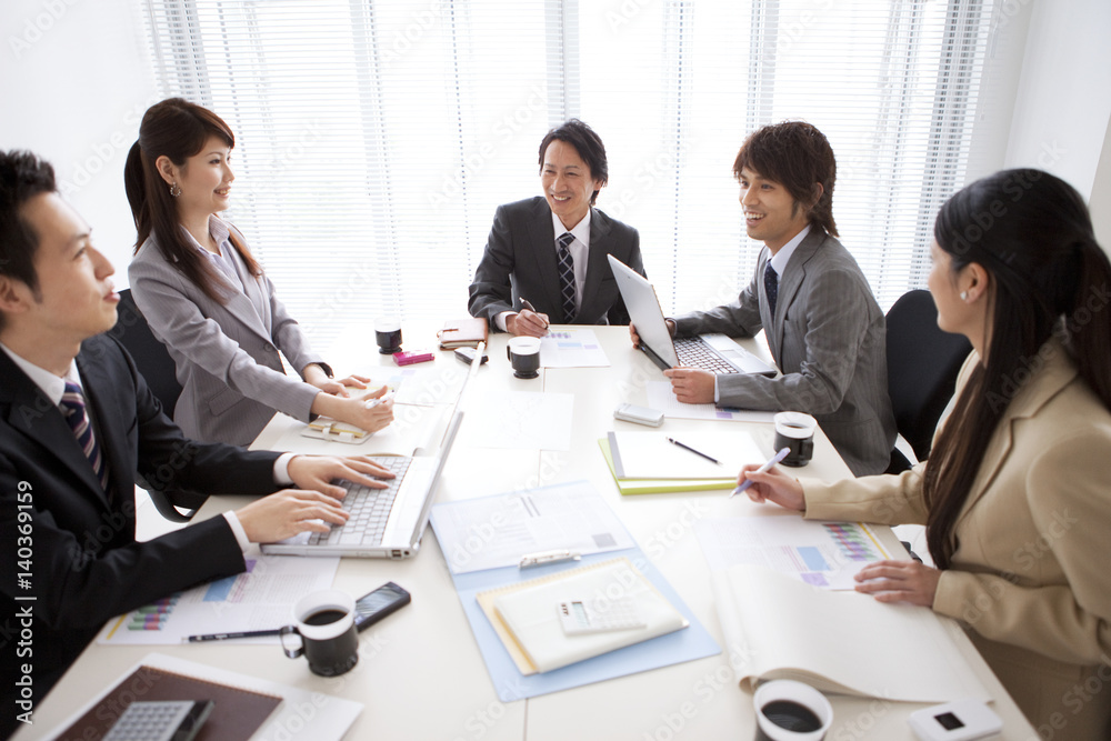 Business people talking in boardroom meeting Business people talking in boardroom meeting