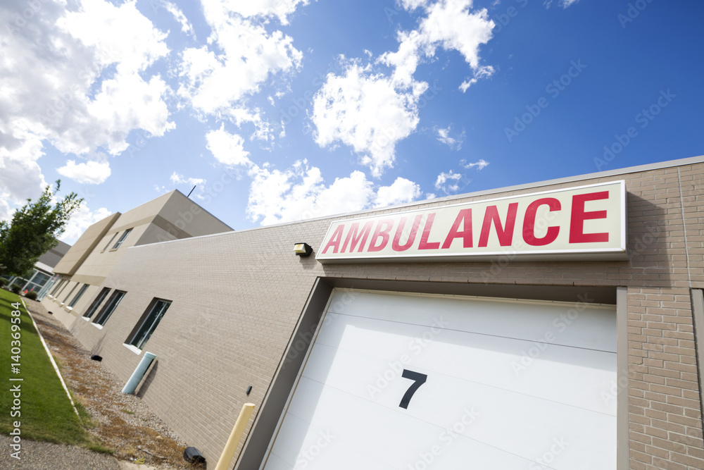 Ambulance Parking Garage Against Sky Ambulance Parking Garage Against Sky