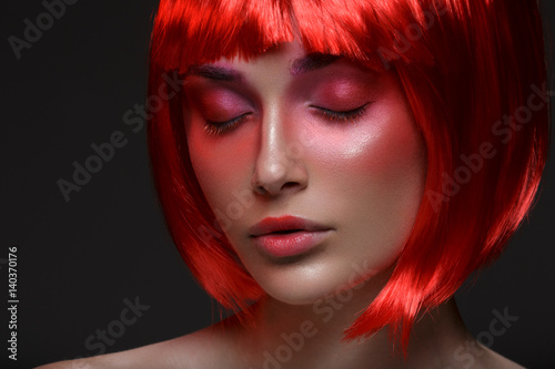 Beautiful girl in red wig