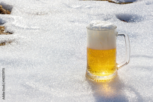 Beer on the background of snow.