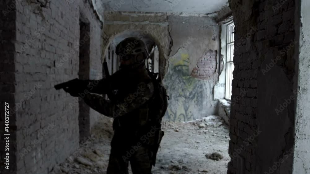 Military men with arms defending the building Military men with arms defending the building