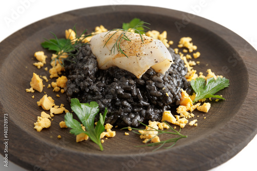Black squid ink risotto with grilled calamary