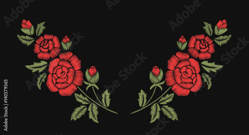 Red roses and green leaves. Embroidery flowers. Neckline.