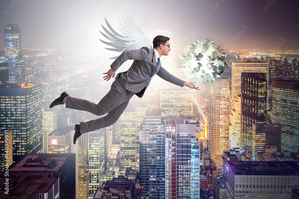 Angel investor concept with businessman with wings Angel investor concept with businessman with wings