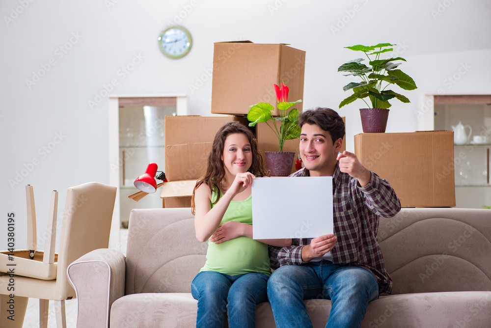 Young couple expecting baby with blank message Young couple expecting baby with blank message