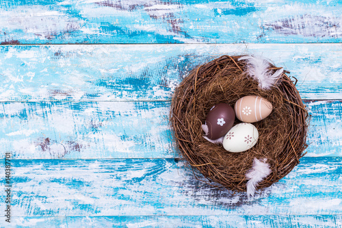 Happy Easter background, eggs, nest photo