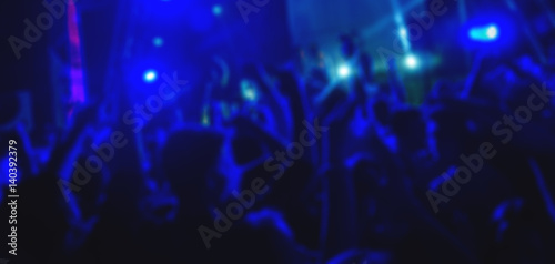 Tableau sur toile Club party with young and happy people.Defocused image