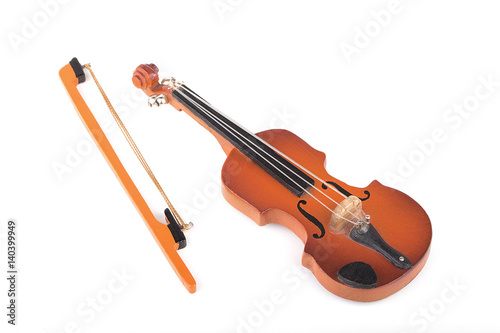 Miniature violin isolated on white.