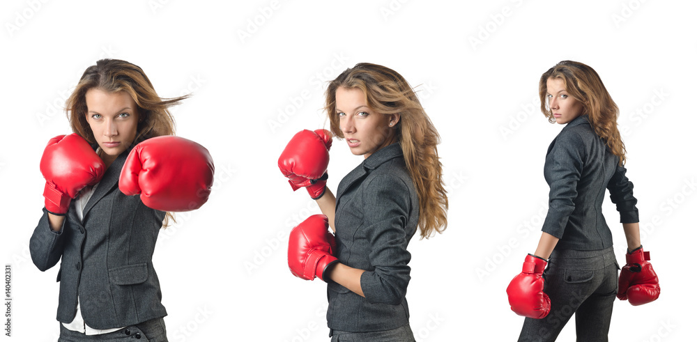 Young woman with boxing gloves isolated on white Young woman with boxing gloves isolated on white