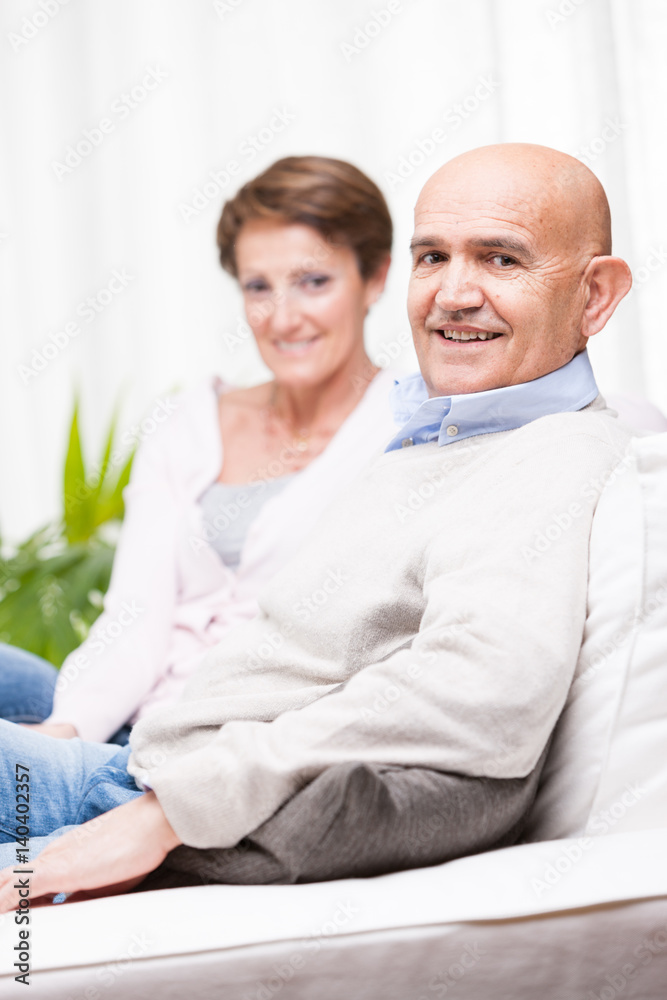 Relaxed friendly middle-aged couple Relaxed friendly middle-aged couple