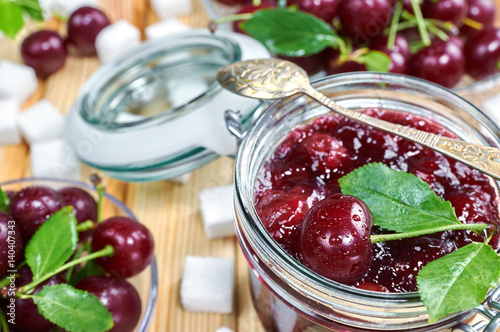 Cherry jam in a jar. Homemade fruit jam