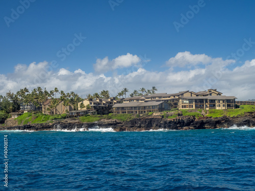 Condominiums along the ocean at Poipu, Kauai. 