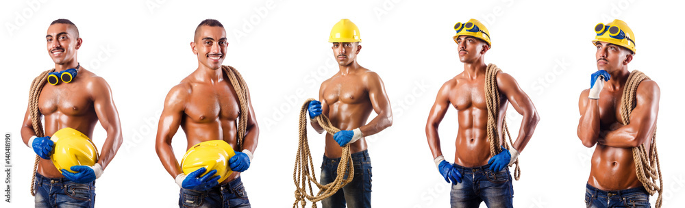 Muscular builder with tools isolated on white