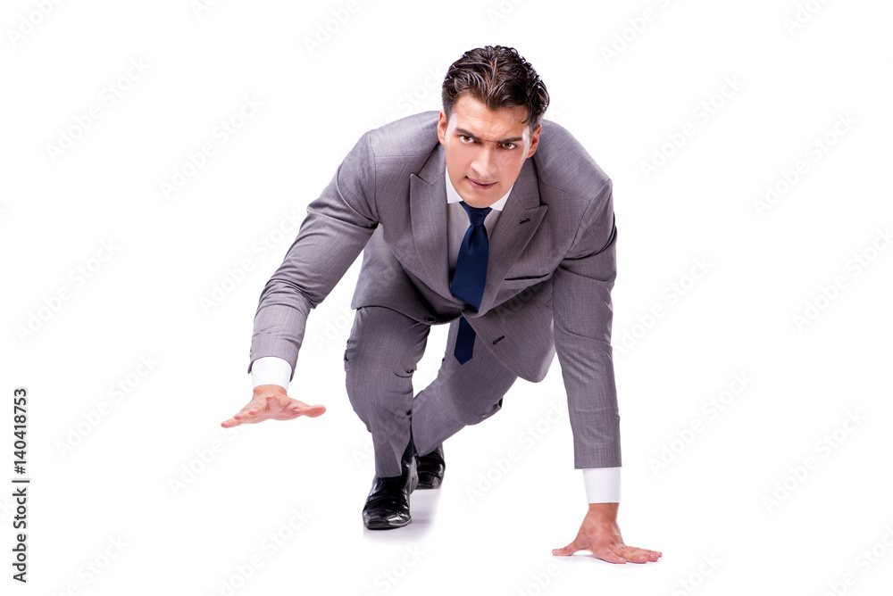 Businessman on start ready for running isolated on white Businessman on start ready for running isolated on white