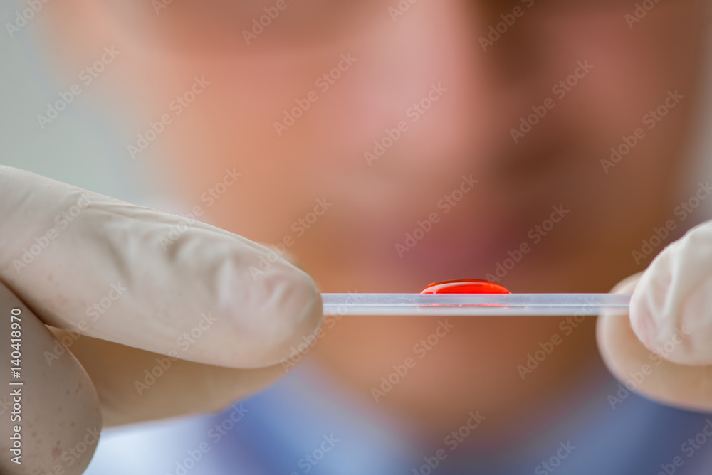 Doctor working with blood samples Doctor working with blood samples