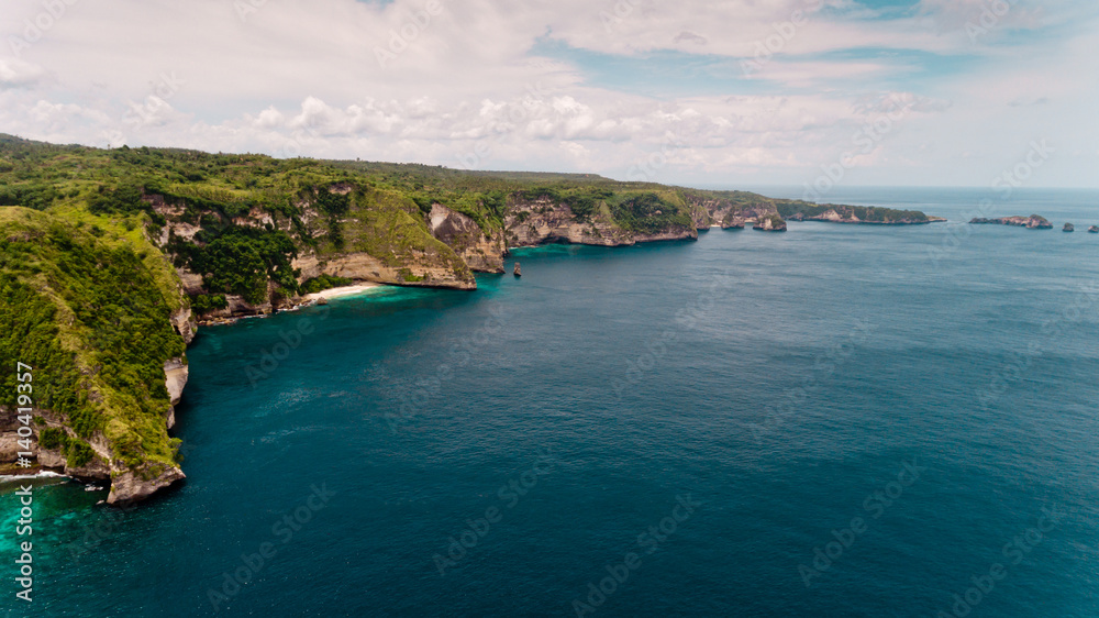 Aerial view on hardly accessible deserted Suwehan beach. Nusa Penida paradise Island, Indonesia.