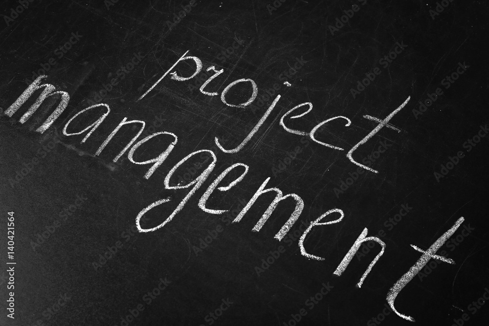 Fototapeta premium Phrase Project Management written on blackboard