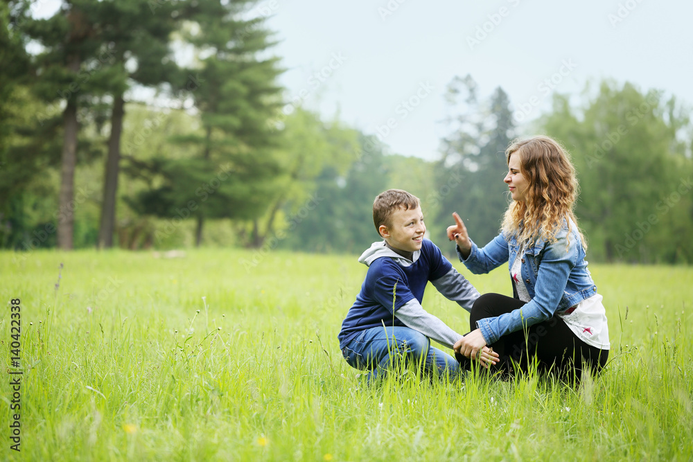 mother playing with his son