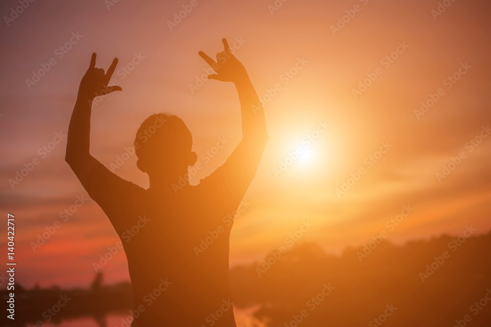 Man show hands silhouette sunset background Man show hands silhouette sunset background