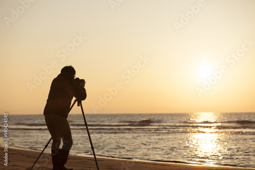 photographer on the beach