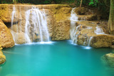 waterfall with clear blue or green emerald water and rock for relax with tree in the jungle at Huay Mae Khamin waterfall for nature landscape and background