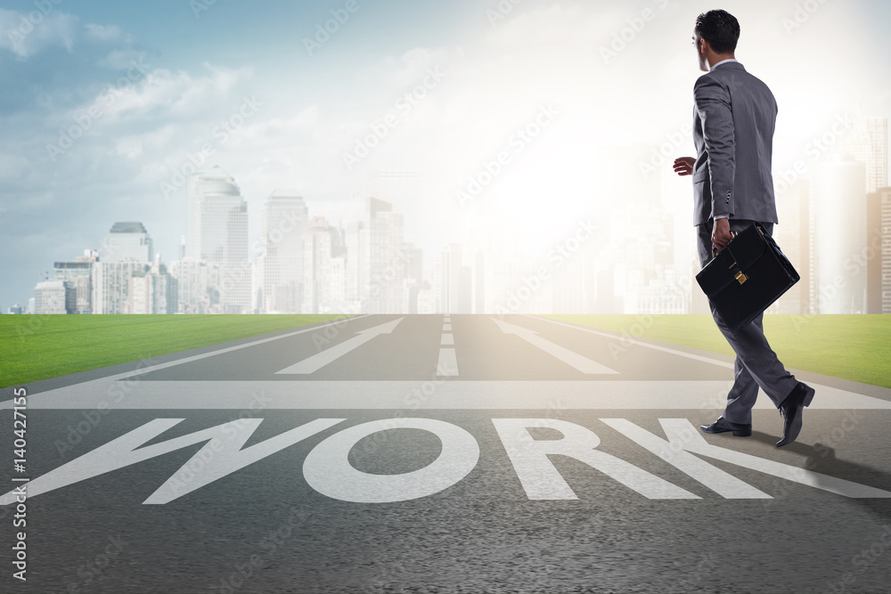 Businessman walking towards his career aspirations Businessman walking towards his career aspirations