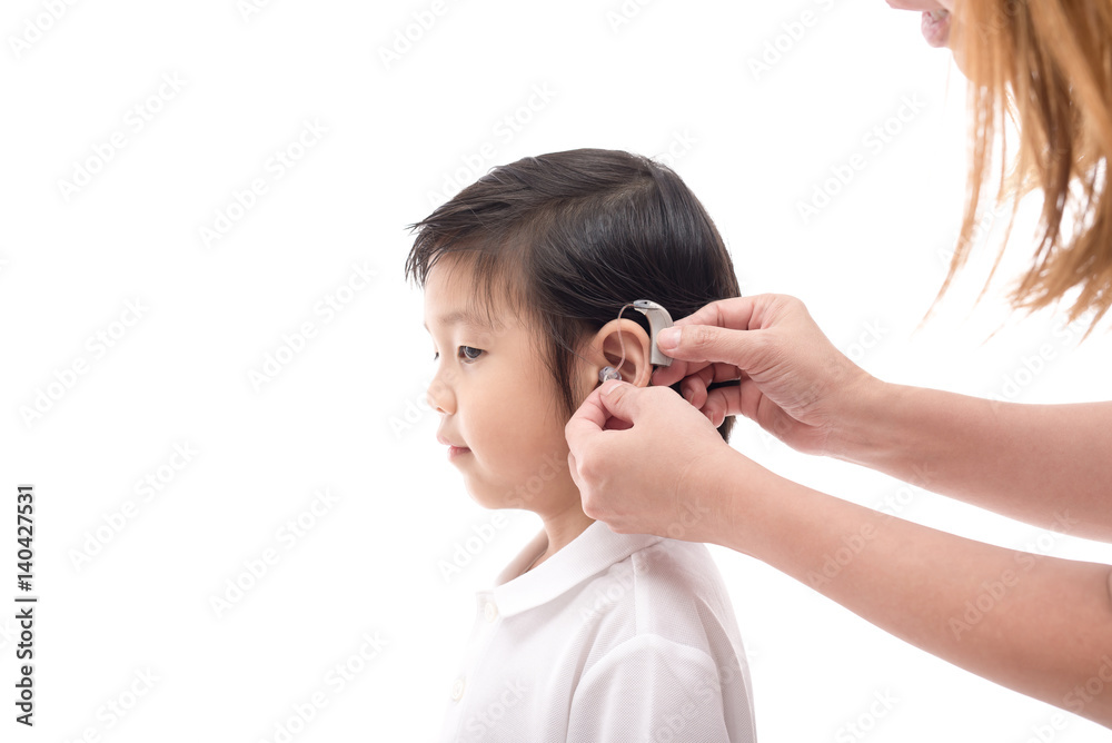 Fototapeta premium Doctor Inserting Hearing Aid