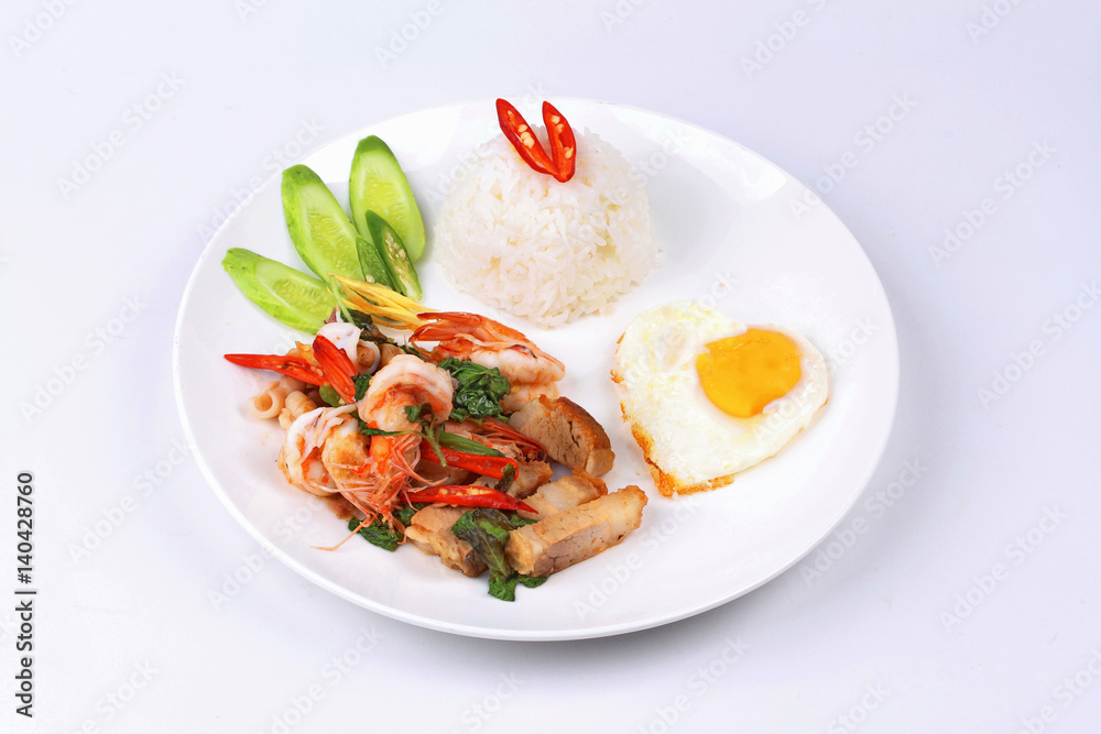 Jasmine rice topped stir - fried spicy basil with meat. Jasmine rice topped stir - fried spicy basil with meat.