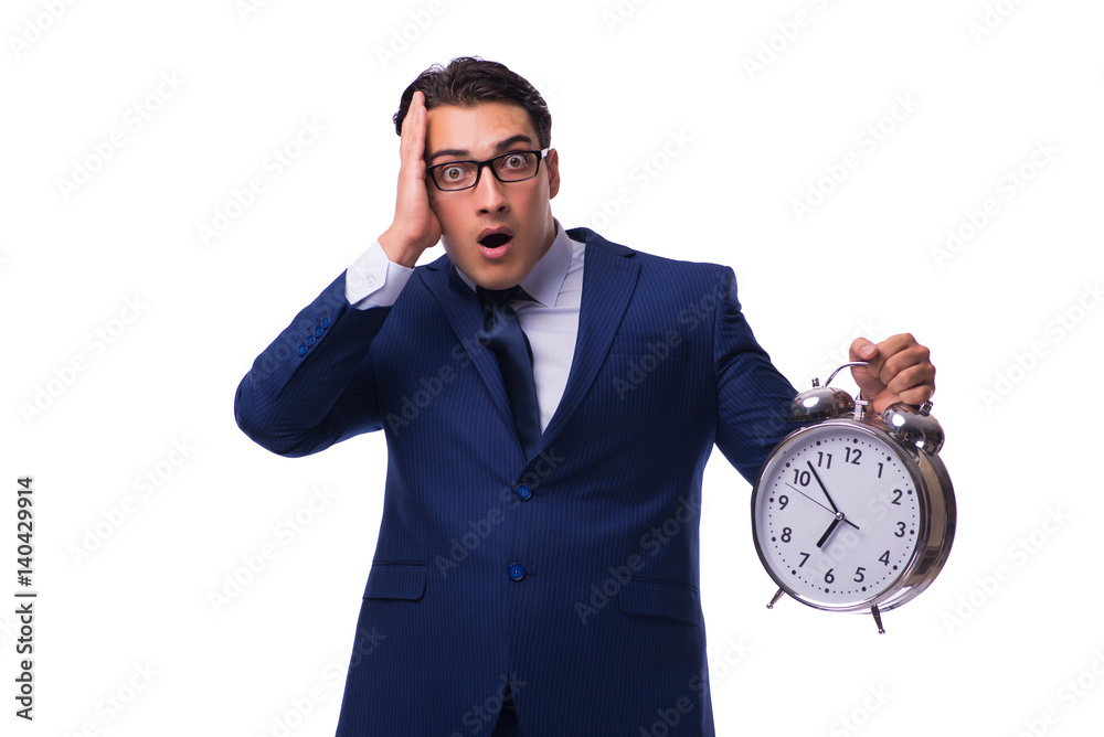 Businessman with alarm clock isolated on white Businessman with alarm clock isolated on white