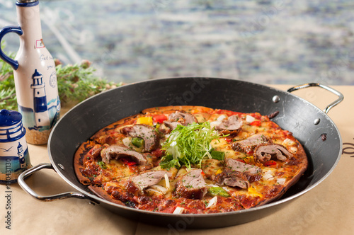 Pizza with Roasted Duck in the pan