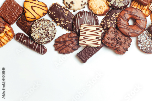 Assortment of mixed biscuits on white background