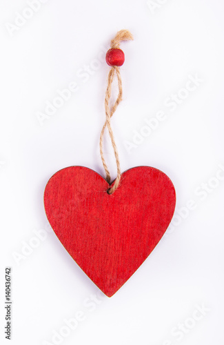 Obraz na płótnie Red heart made of wood. Wooden pendant in the shape of heart. w salonie
