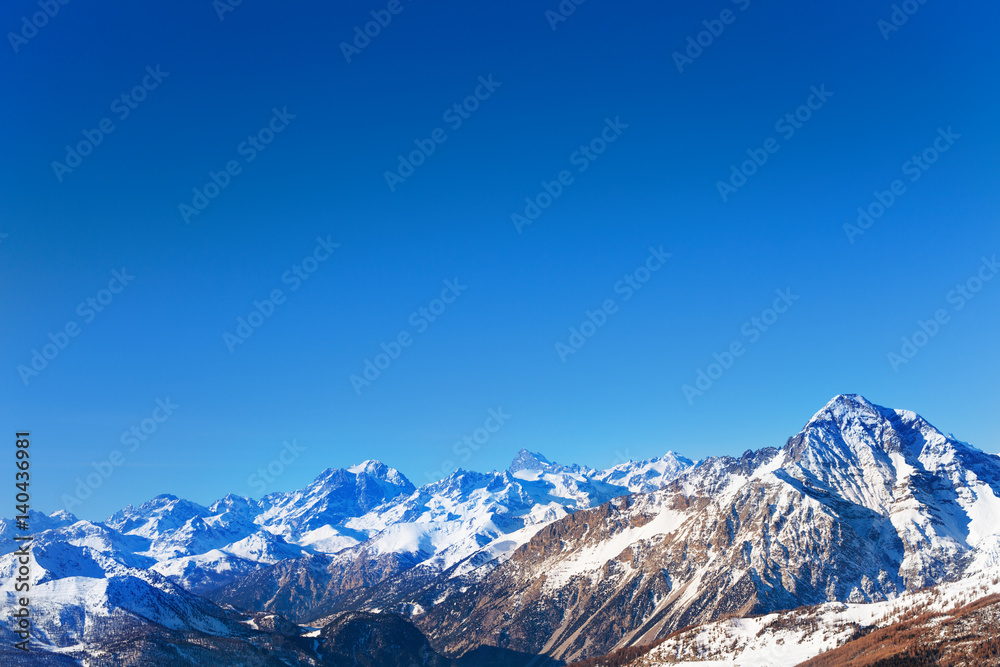 Panoramic view of snowcapped mountain at sunny day Panoramic view of snowcapped mountain at sunny day