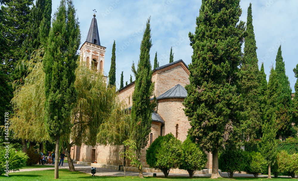 Bell tower and St. George's church in Monastery of St. Nino at Bodbe. Sighnaghi. Georgia