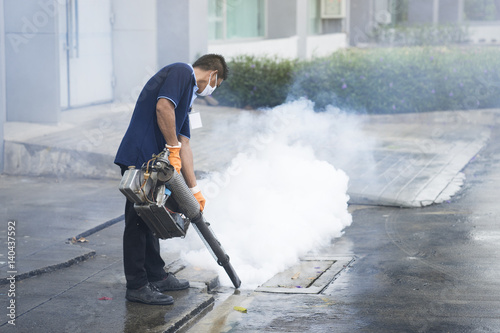 The man fogging to eliminate mosquito