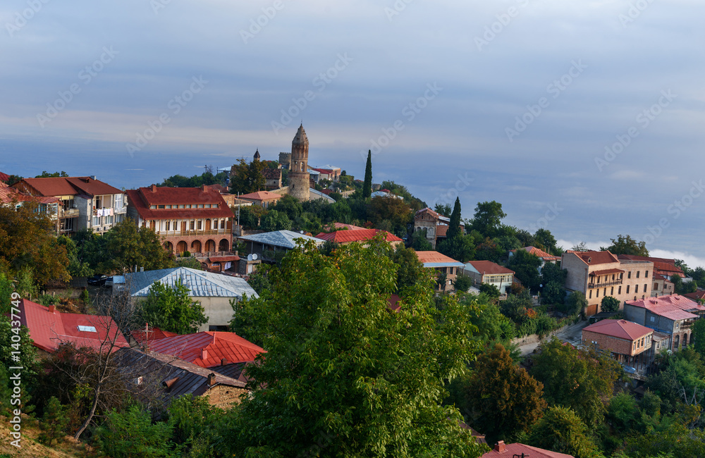 View of houses and old church in Signagi or Sighnaghi city. Georgia