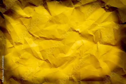 wrinkled yellow paper texture , copy space