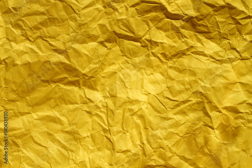 wrinkled yellow paper texture , copy space