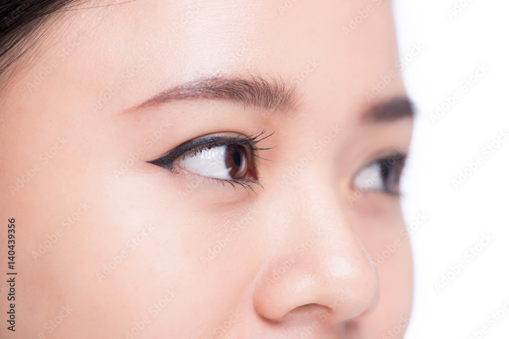 Asian eye woman eyebrow eyes lashes over white.